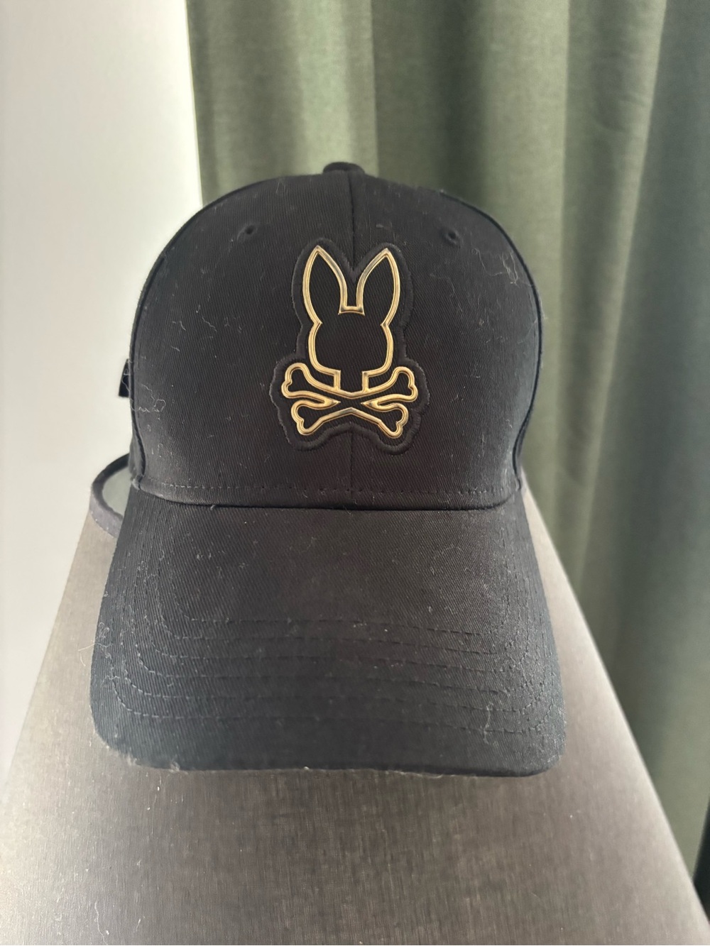 Psycho Bunny Black Cap with Gold Bunny Skull Patch